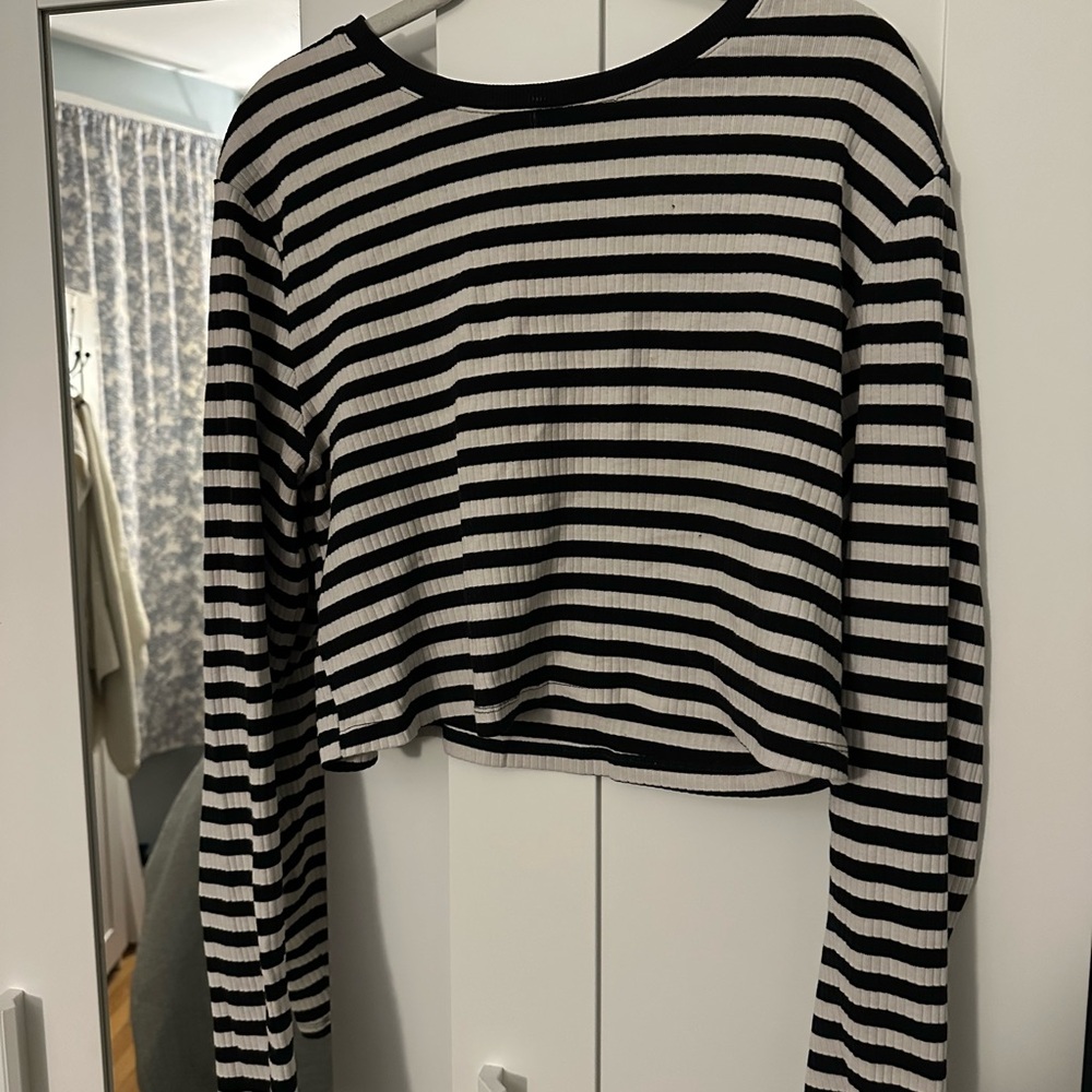 Well loved black and white striped long sleeve shirt